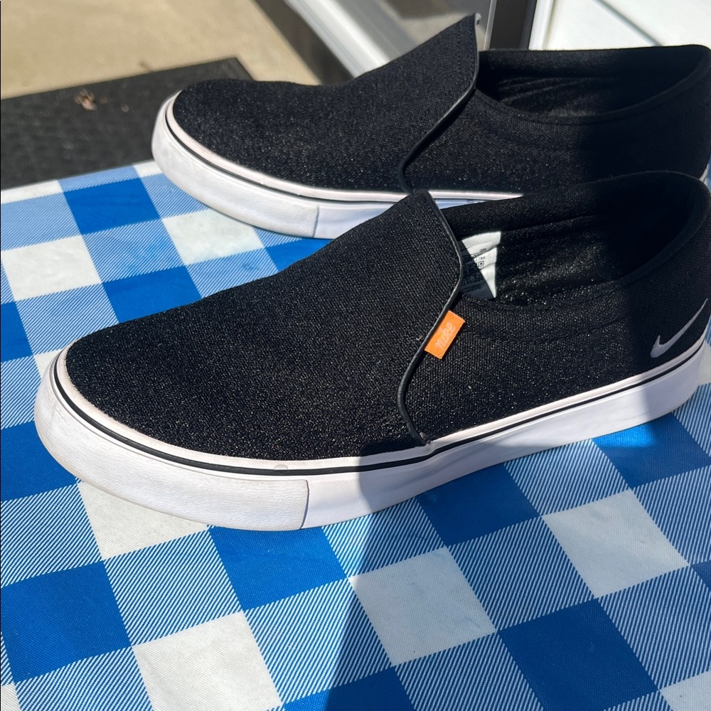 Nike black Slip-On Sneakers with White Soles